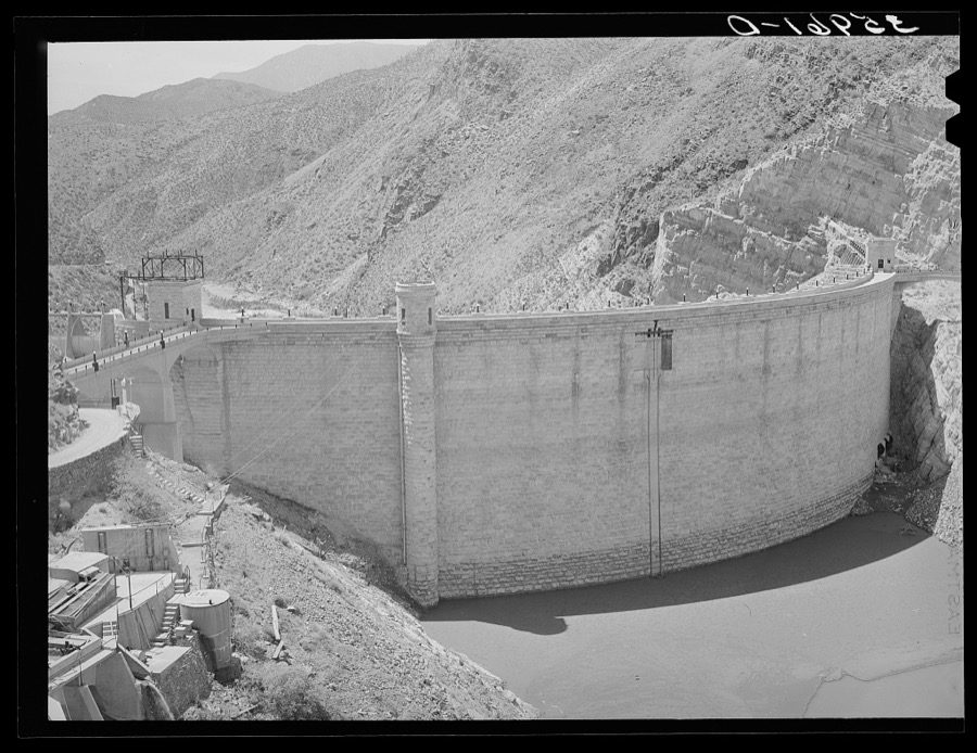Roosevelt Dam showing small amount of impounded water because of extended drought. This is the main source of water for irrigation in the Salt River Valley. Gila County, Arizona