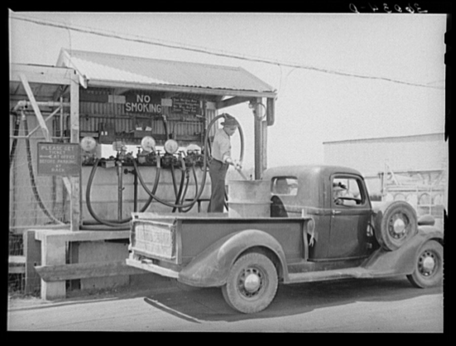 Member of the United Producers and Consumers Cooperative having a drum filled with gasoline at the warehouse. Phoenix, Arizona