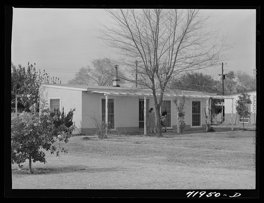 Phoenix, Arizona. Camelback Farms, FSA (Farm Security Administration) project. Neighbors meeting at one of the houses