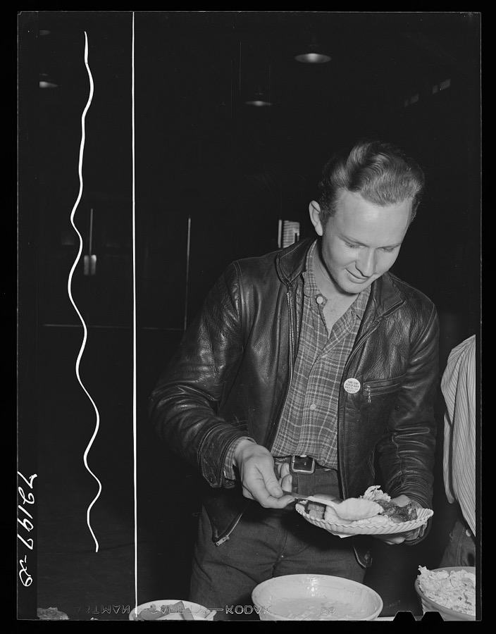 Farm worker at dinner at the second annual field day of the farm workers' community. Yuma, Arizona