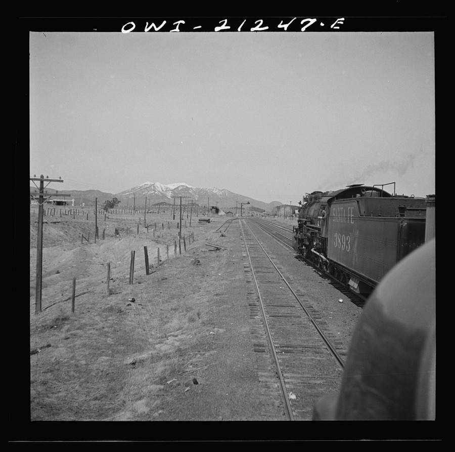 Winona, Arizona. Passing another freight train in a siding along the Atchison, Topeka and Santa Fe Railroad between Winslow and Seligman, Arizona