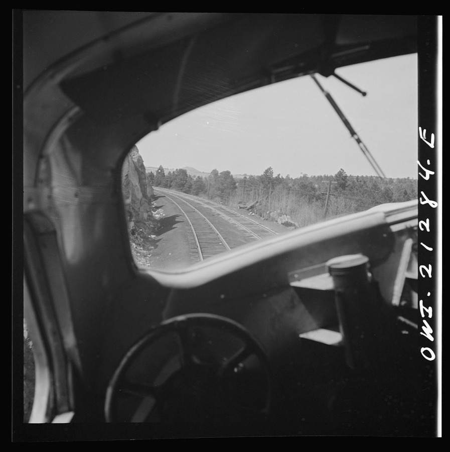 Williams, Arizona. On the Atchison, Topeka and Santa Fe Railroad between Winslow and Seligman, Arizona, going around a curve in the mountains