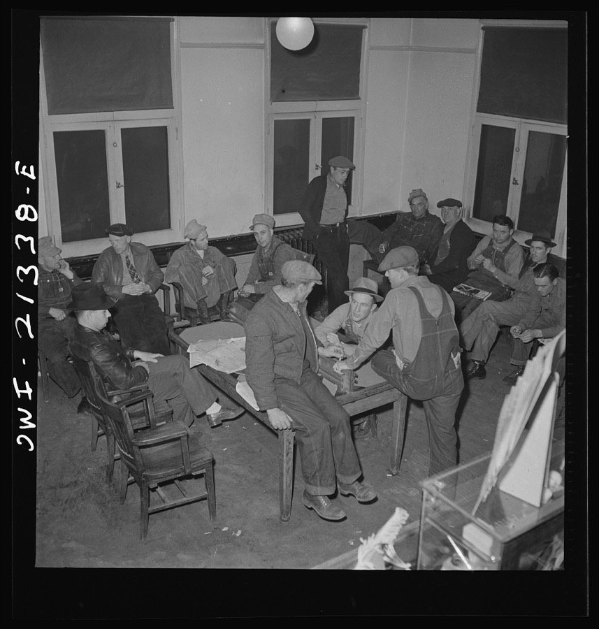 Seligman, Arizona. Railroad men lounging in the lobby of the Harvey House near the Atchison, Topeka, and Santa Fe Railroad yard