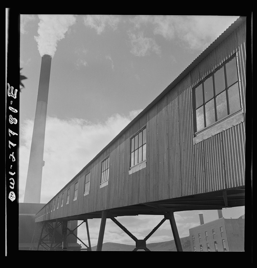 Morenci, Arizona. Conveyor galleries where ore is transported to the smelter plant in the background