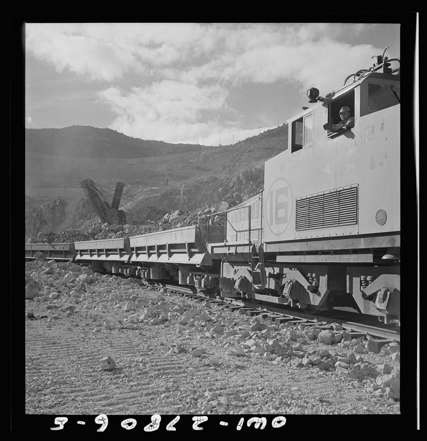 Morenci, Arizona. Loading copper ore from an open-pit mine on an ore train on its way to the smelter plant of the Phelps Dodge mining corporation