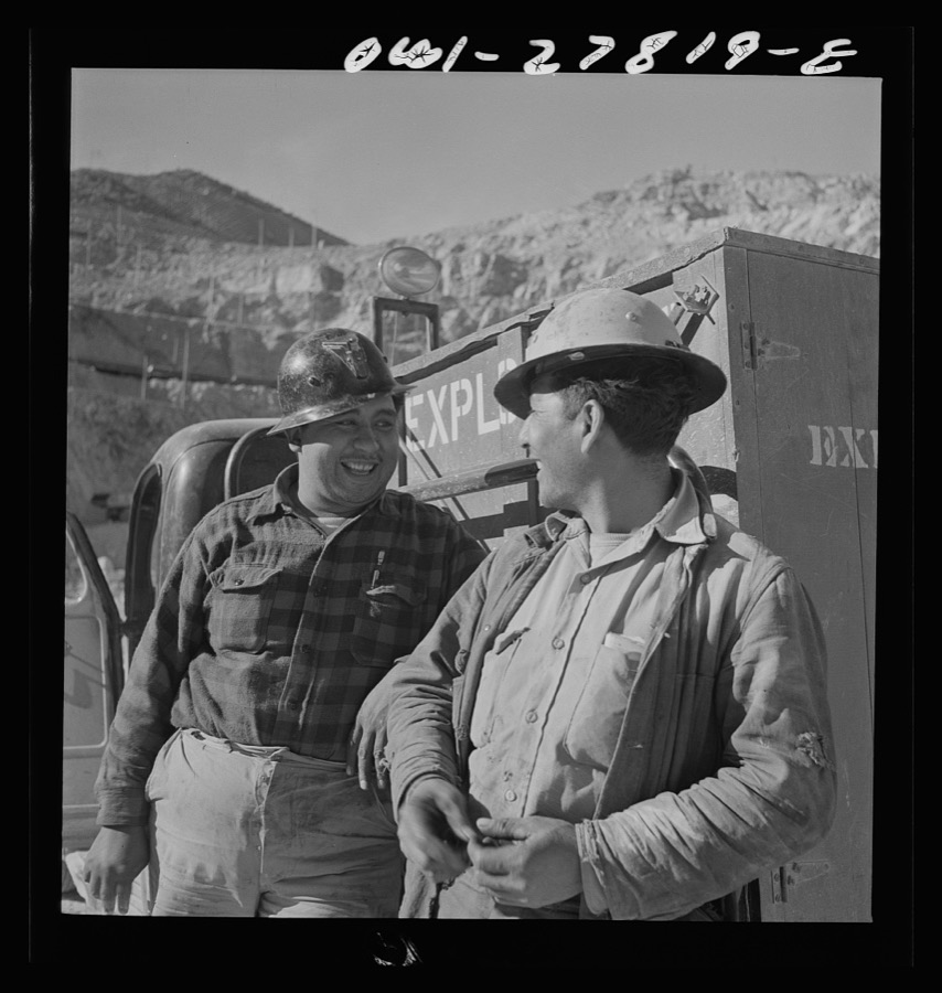 Morenci, Arizona. Three handy workers transport and dispense the explosives used for blasting at a large open-pit copper mine of the Phelps Dodge mining corporation