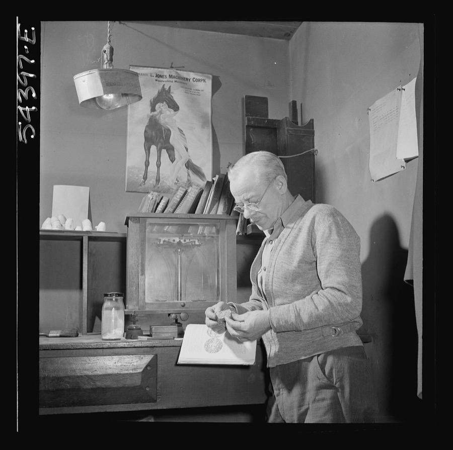 Kingman (vicinity), Arizona. Mr. Relling, in the laboratory, analyzing tungsten ore and concentrates in a plant near the Boriana mines where the chromium-like metallic elements are obtained