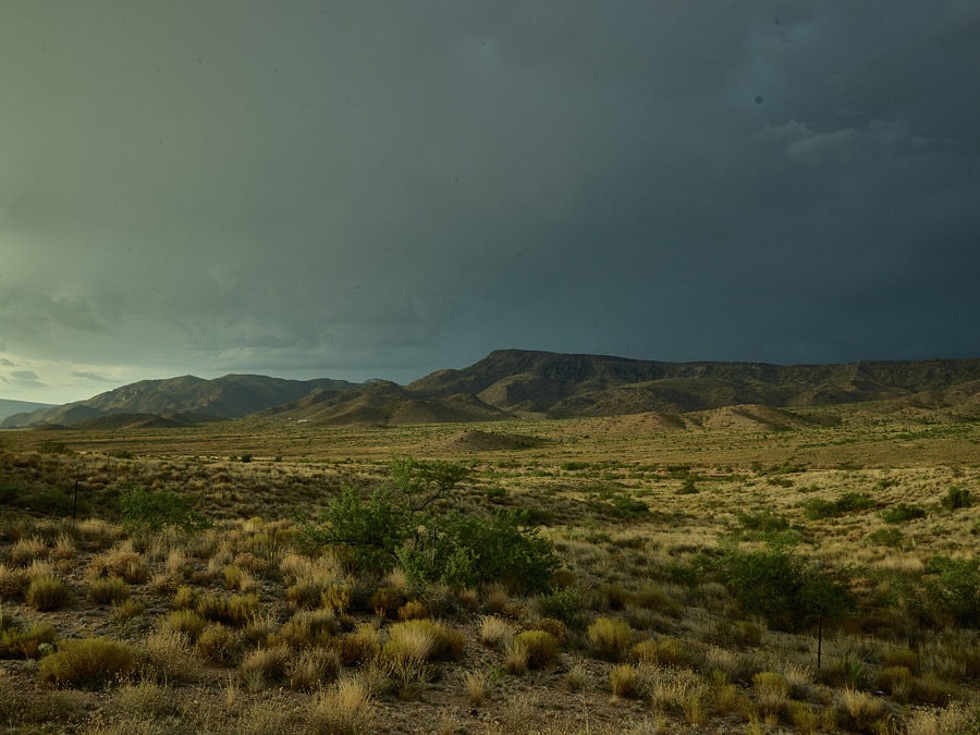 A storm brews over the high desert near Peach Springs in Mohave County, Arizona
