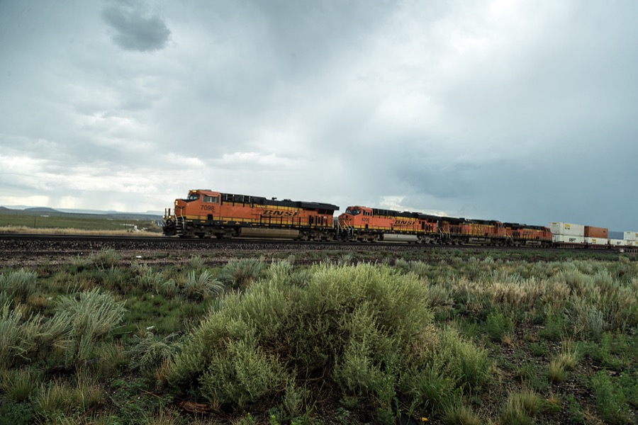 [A freight train on the Burlington Northern Santa Fe Railroad (BNSF RR) chugs across a lonely stretch of Arizona's high desert between Seligman and Ash Fork in Yavapai County