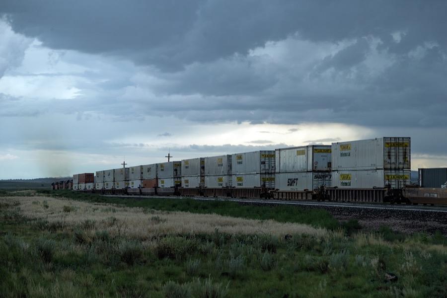 [A freight train on the Burlington Northern Santa Fe Railroad (BNSF RR) chugs across a lonely stretch of Arizona's high desert between Seligman and Ash Fork in Yavapai County