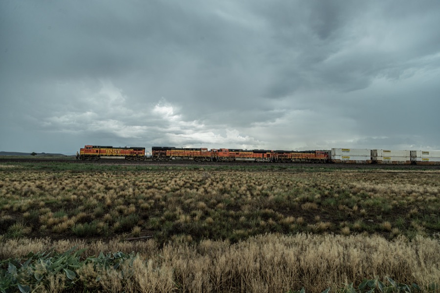 [A freight train on the Burlington Northern Santa Fe Railroad (BNSF RR) chugs across a lonely stretch of Arizona's high desert between Seligman and Ash Fork in Yavapai County