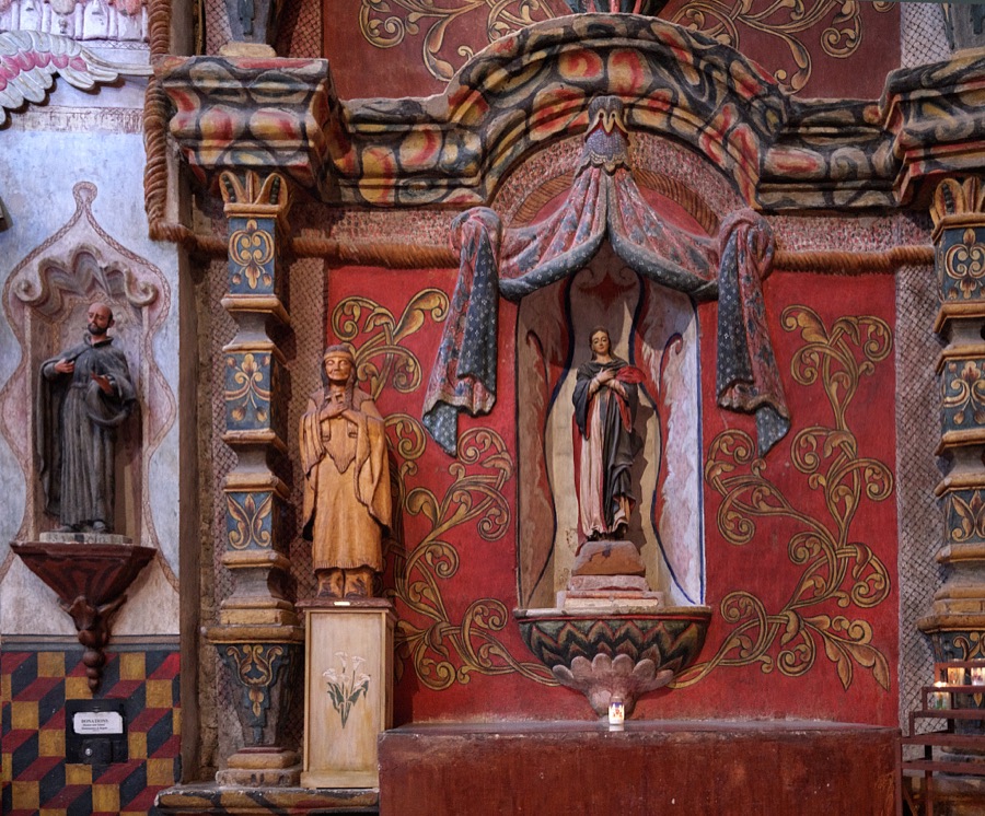 Ornate sanctuary details within the Mission San Xavier del Bac, a Spanish Catholic mission, completed in 1797 on what is now the Tohono O'odham San Xavier Indian Reservation in Pima County, Arizona, just south of Tucson