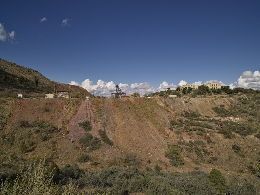 View across a deep gully at part of the old mining boomtown of Jerome, on Cleopatra Hill overlooking the Verde Valley in Yavapai County, Arizona