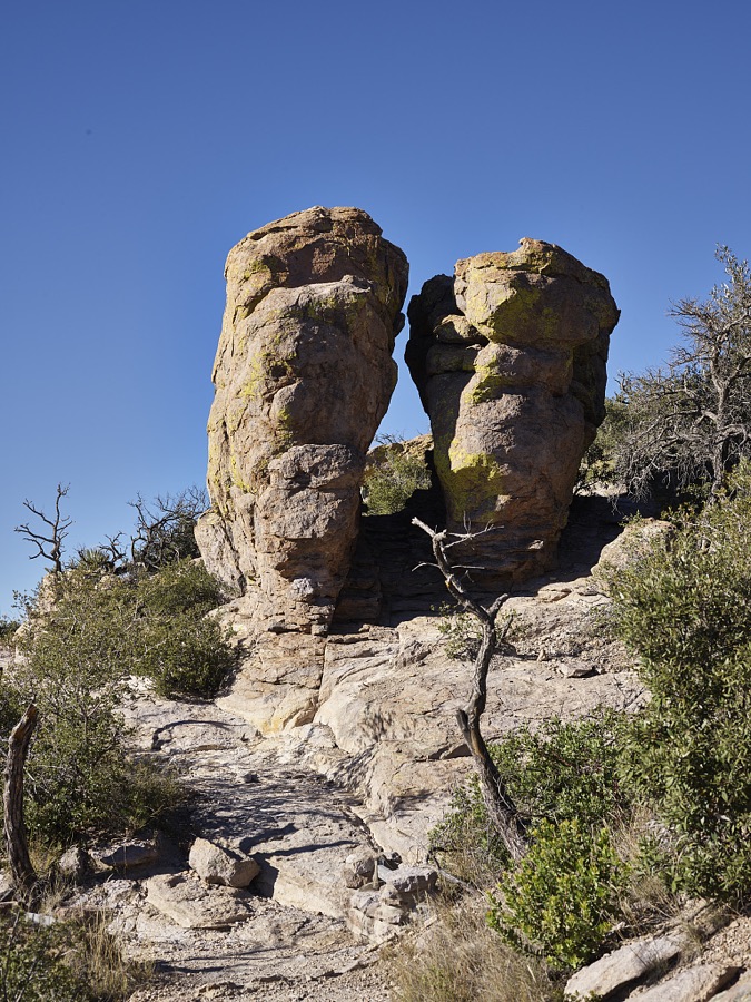 Rock formations at Chiricahua National Monument, a National Park Service unit in Cochise County, Arizona, that includes balanced rocks and hoodoos, thin spires of rock that protrude from the bottom of an arid badland