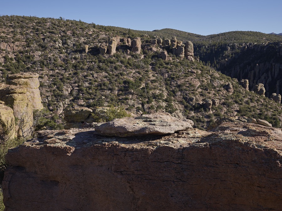 Rock formations at Chiricahua National Monument, a National Park Service unit in Cochise County, Arizona, that includes balanced rocks and hoodoos, thin spires of rock that protrude from the bottom of an arid badland