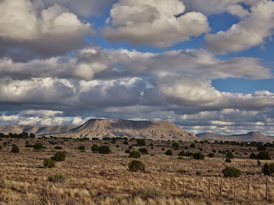 Scene along old U.S. highway 66 in Mohave County, Arizona. Much of Route 66, America's best-known historic highway, which was known as "the Mother Road," connecting Chicago, Illinois, and Santa Monica, California, in the heyday of cross-country family travel from the 1930s through th 50s, has been subsumed by the nation's high-speed interstate highways. But a bending portion of the old, two-lane highway that survives in western Arizona still draws curiosity-seekers and nostalgia buffs