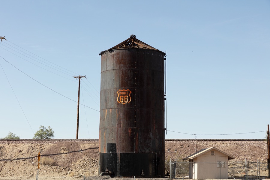 A long-abandoned storage silo carrying a logo for old U.S. Highway 66 near Toprock, a tiny Mohave County town on the Arizona side of the Colorado River, across from Needles, California. Route 66, once the "Mother Road" main east-west connection between Chicago and Santa Monica, California, was abandoned here, too, paved over by the four-lane, high-speed Interstate 40 highway