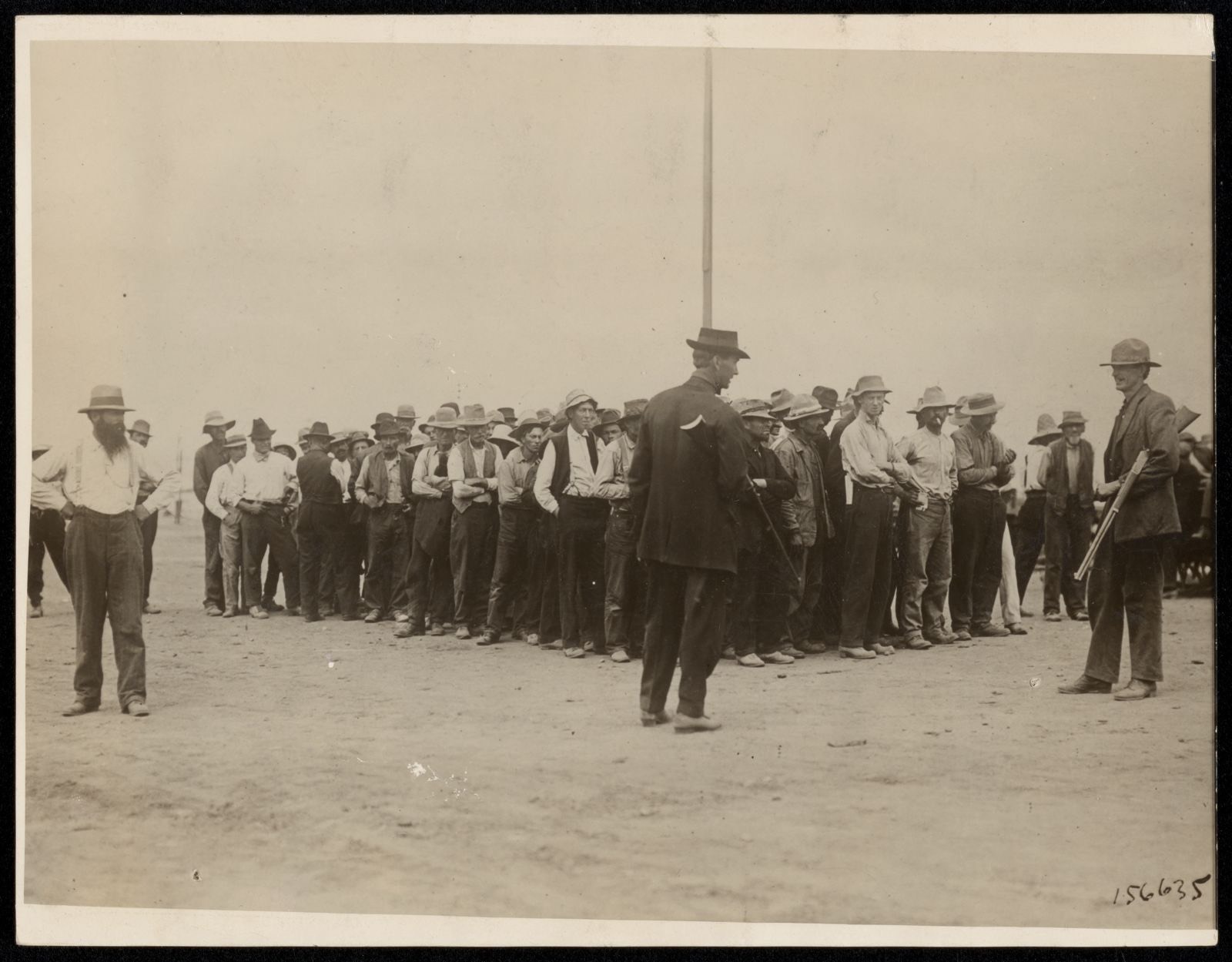 Four Killed Seven Shot. Militia Called Out at Wheatland California Hop Strike. Strikers waiting under guard of sheriffs posse for pay., Boston Public Library - undated
