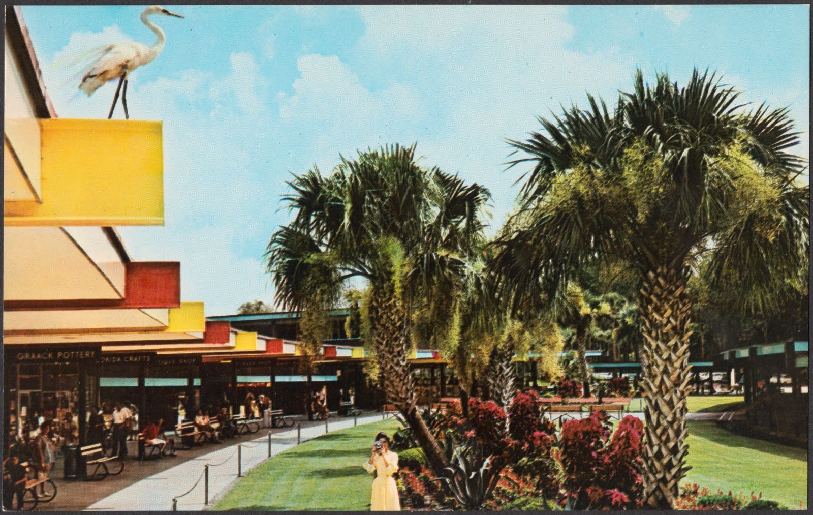 A covered promenade bordered by a colorful garden area is an architectural feature of the handsome administration building at Florida's famous Silver Springs, Boston Public Library - undated
