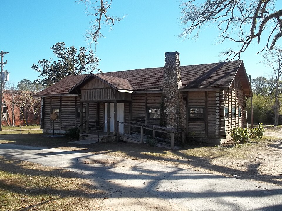 Photograph of Sneads Community House and Old Pump