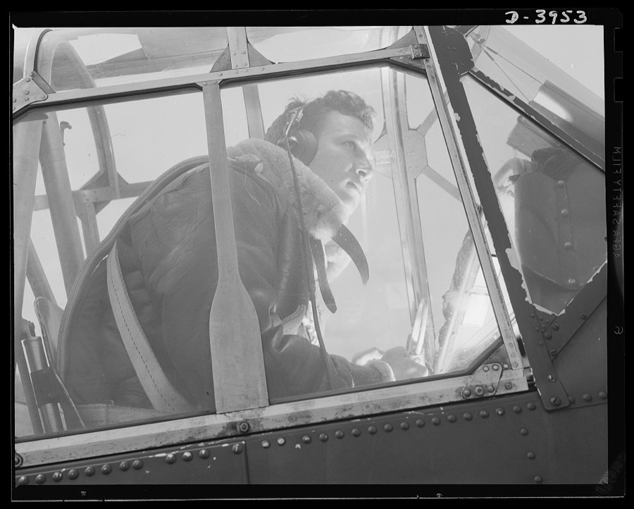 Fort Benning. Air corps pilots in training. An eaglet tries his wings. When this student pilot has completed his training course at Fort Benning, Georgia, the Army will have another good man who knows what it is all about