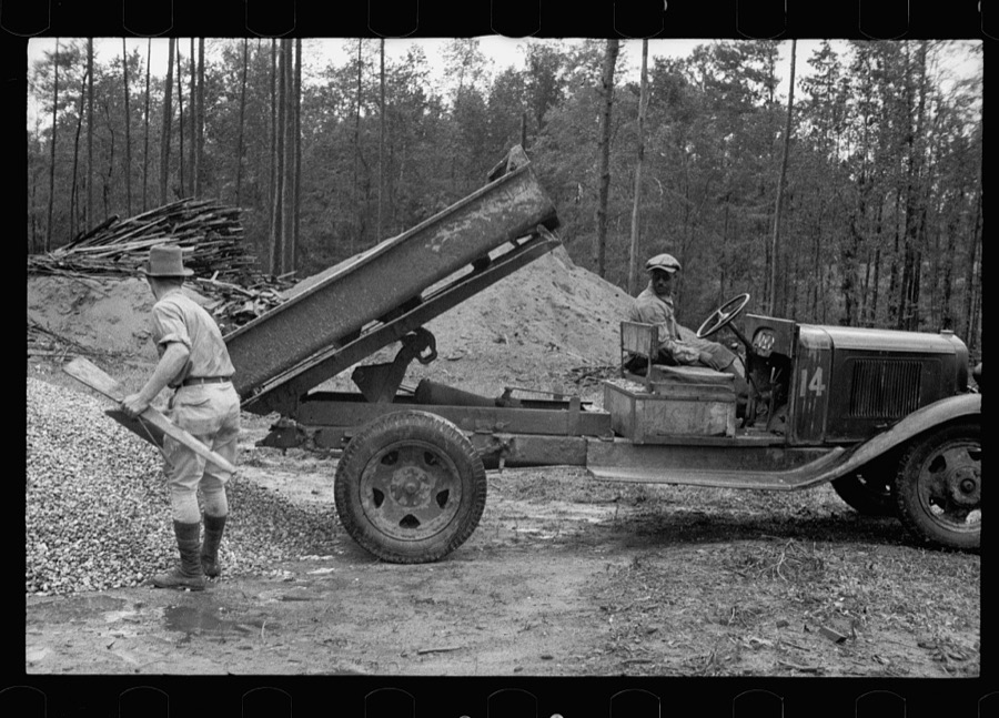 Truck dropping building materials, Grady County, Georgia
