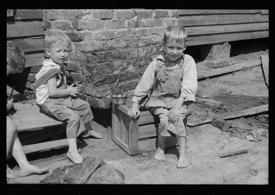 Son of a farmer on Wolf Creek Farms project who has not yet been moved to a new house, Wolf Creek Farms, Grady County, Georgia