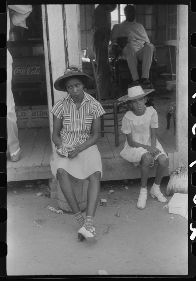 Saturday afternoon outside of a Negro store and barbershop in Union Point, Greene County, Georgia
