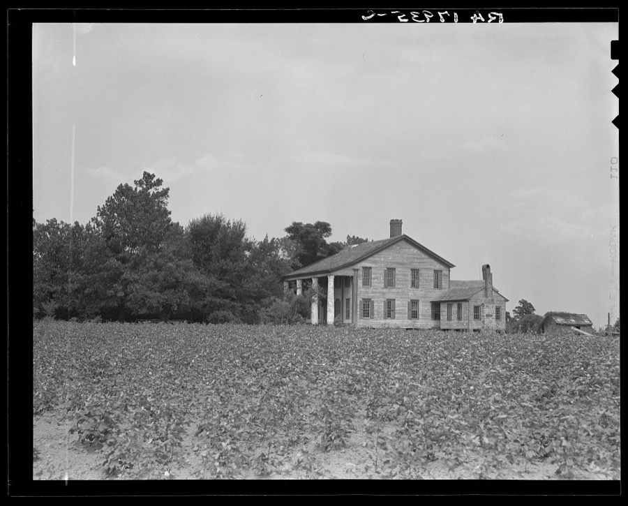 Pharr Plantation house near Social Circle, Georgia. This house was built in 1840 by slave labor. The bricks came from England to Savannah, thence by oxteam to the plantation. The plantation formerly had 150 slaves, is now abandoned by the one remaining member of the family, and the land rented out to small farmers