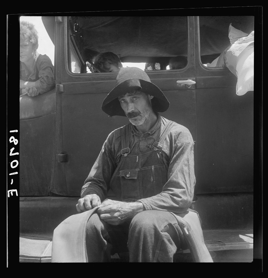 Douglas, Georgia. South Georgia tobacco sharecropper during the tobacco auction. In order to eke out a living members of the sharecropper families in recent years have begun to migrate to Florida after cotton or tobacco harvest to work in fruits or vegetables