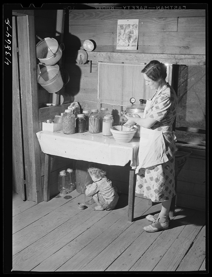 Mrs. L. Smith still has some canned goods left over from the winter. Carroll County, Georgia (see general caption)