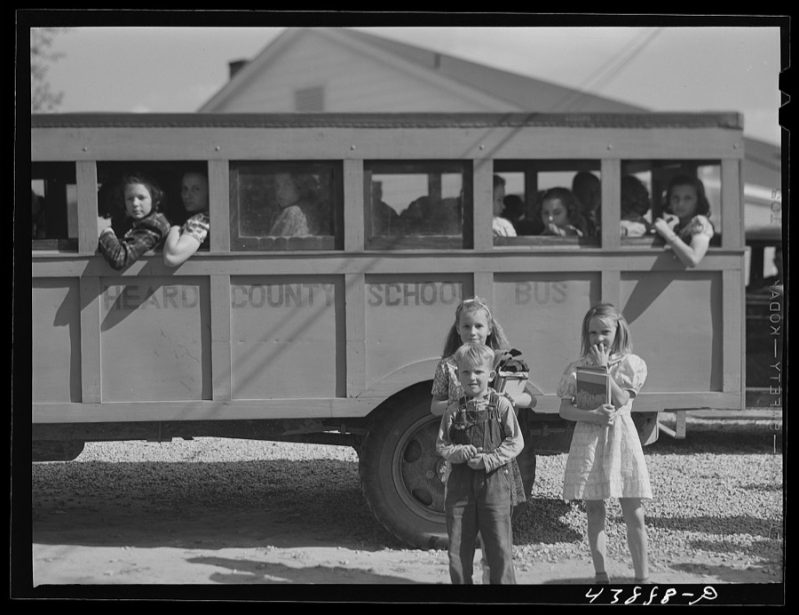 Schoolchildren and bus. Franklin, Heard County, Georgia