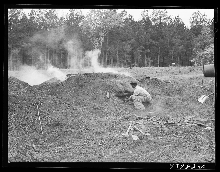 Henry Dukes, Negro FSA (Farm Security Administration) borrower, burning charcoal. Southwestern part of Heard County, Georgia