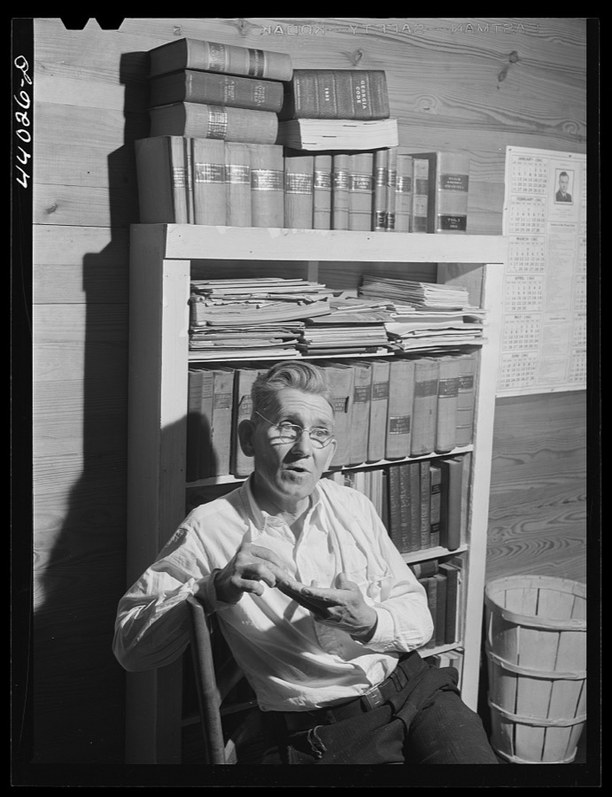 Mr. J. H. Parham, barber and notary public, in his shop in Centralhatchee, Heard County, Georgia