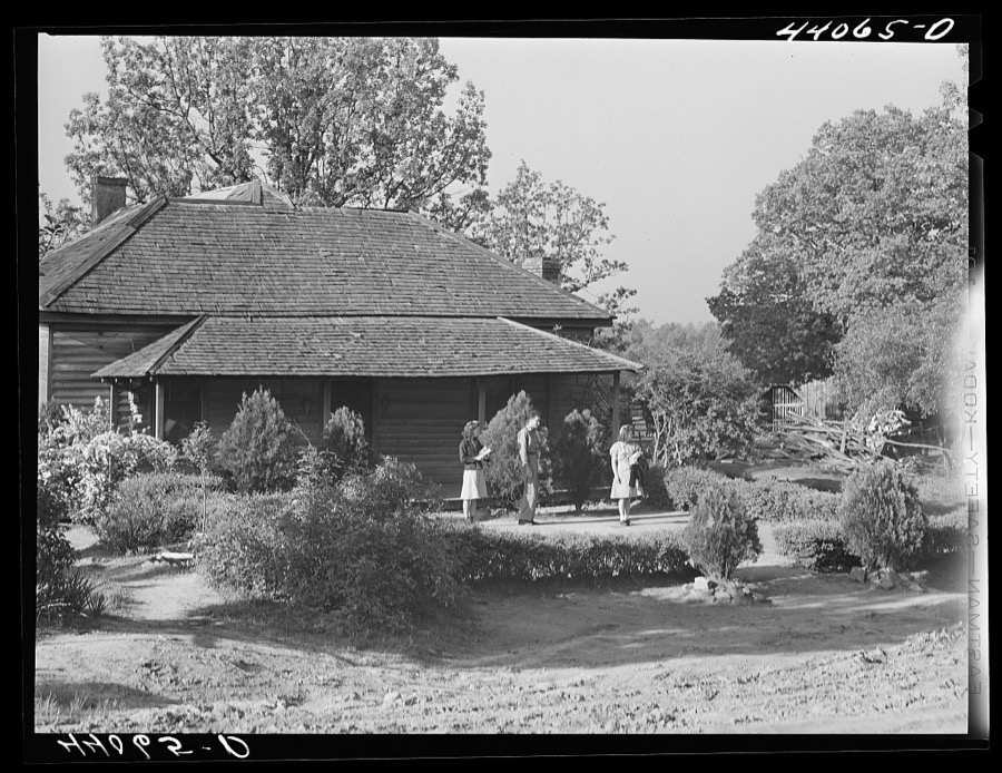 Three of the children of Lemuel Smith, FSA (Farm Security Administration) borrower, waiting outside their house for the school bus. Carroll County, Georgia