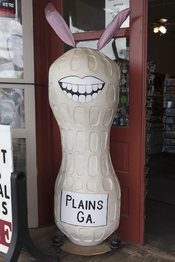 Smiling peanut figure (with added ears for the Easter season to represent an Easter bunny) outside a store in former U.S. president Jimmy Carter's hometown of Plains, Georgia