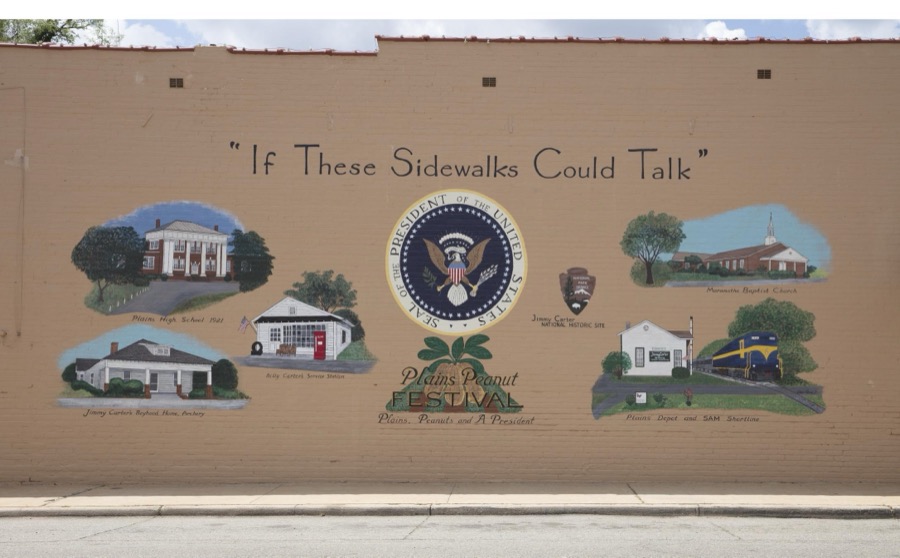 Mural ("If these sidewalks could talk") on the train depot in Plains, Georgia, depicting scenes relating to two of the town's most famous natives: former U.S. president Jimmy Carter and his youngest brother, Billy