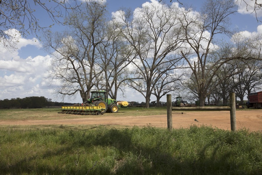 Tractor and plow at work on a field near Plains in Sumter County, Georgia