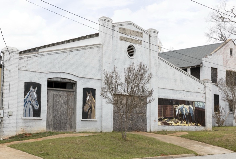 Drawings of horses on a former feed store and hardware in Louisville, a town in northeastern Georgia, named for French King Louis XVI in appreciation for French assistance to the colonists during the American Revolution