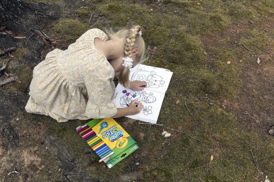 Elsie Unruh fills in colors in her book during Heritage Day in Louisville, a town in northeastern Georgia, named for French King Louis XVI in appreciation for French assistance to the colonists during the American Revolution