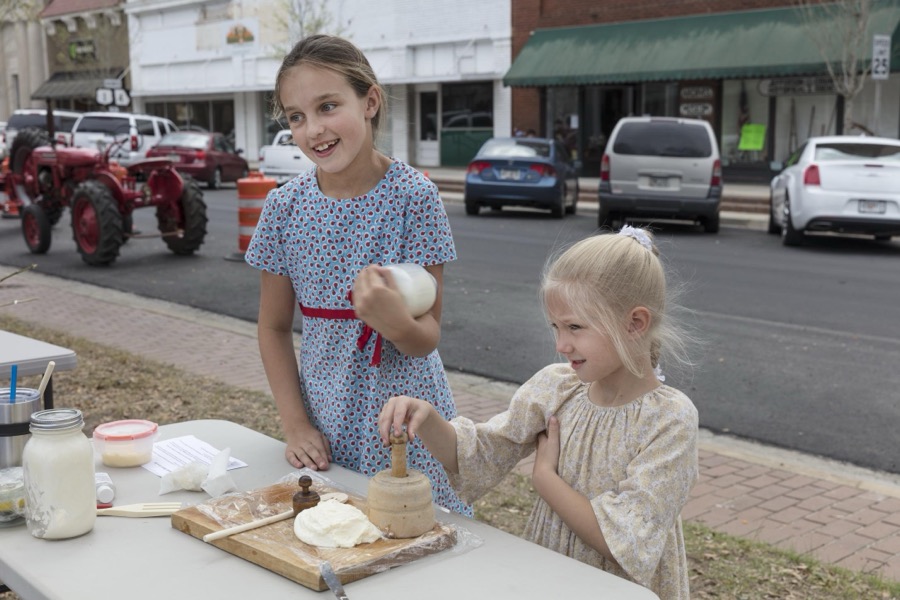 Blaine Holdeman, left, and Jesse Unruh test some samples during Heritage Day n Louisville, a town in northeastern Georgia, named for French King Louis XVI in appreciation for French assistance to the colonists during the American Revolution