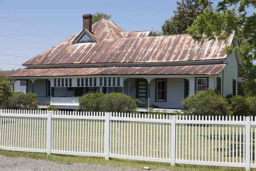Characteristic old Georgia building with a pitched tin roof in Nahunta, Georgia