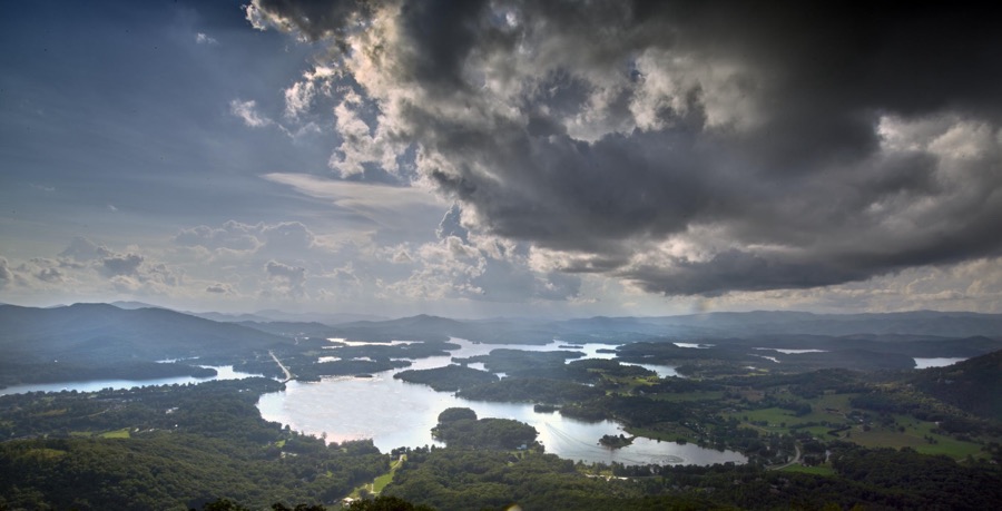 View of a menacing cloud above Lake Chatuge, which spills across the state line dividing Georgia and North Carolina, from the Hal Herrin Overlook on Bell Mountain, high in Towns County, Georgia