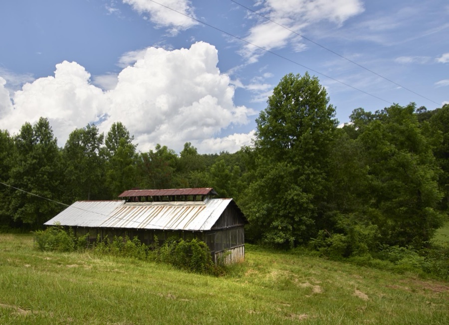 Unusual old barn with a ventilation deck near Clarkesville in Habersham County, Georgia