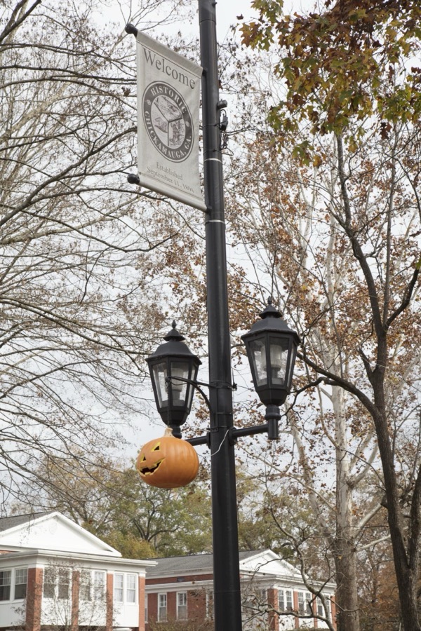 One of many carved-pumpkin decorations, hung on lamp posts for the Halloween holiday season, in Chickamauga, Georgia