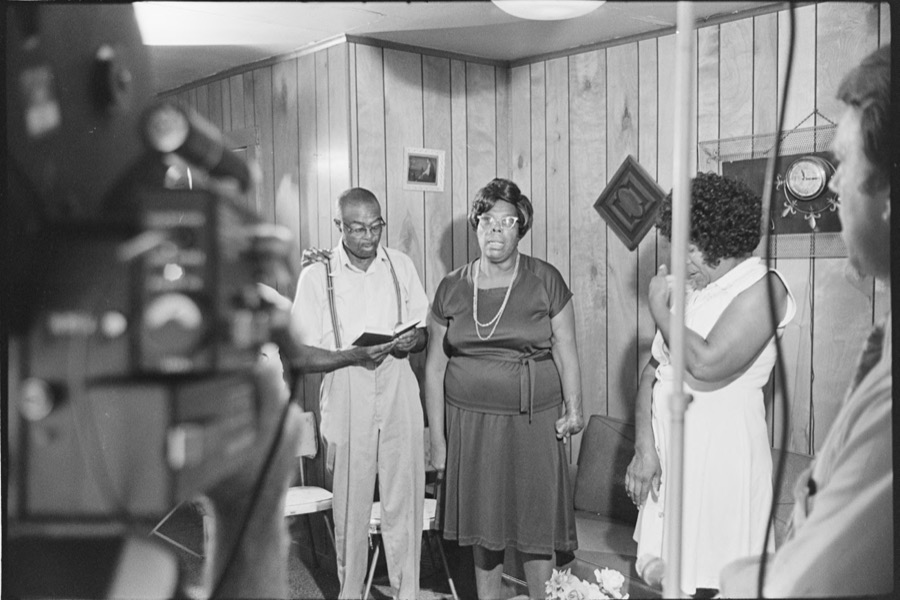 WALB-TV crew filming hymn singing at Reverend Dennard's house, Tifton, Georgia; Church of God near Enigma, Georgia; Turner Primitive Baptist Church, Tift County, Georgia