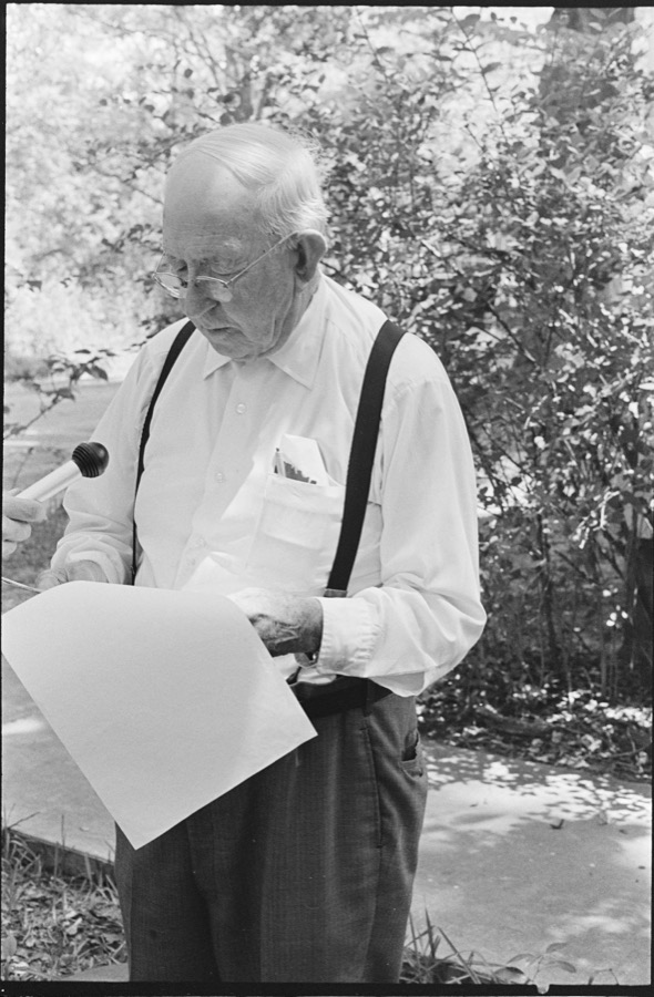 People and scenes, Fitzgerald, Georgia, including David Paulk reading riddles, dolls for sale at Dorminy Memorial Hospital, Ben Hill County Courthouse, and C.M. Copeland's woodcarving shop