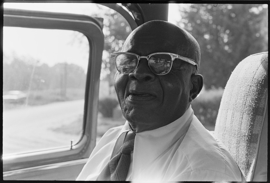 Ernest C. Fuller and Annie Gaskin, portraits made while traveling, near Tifton, Georgia; Houses with residents on porch, Sylvester, Georgia