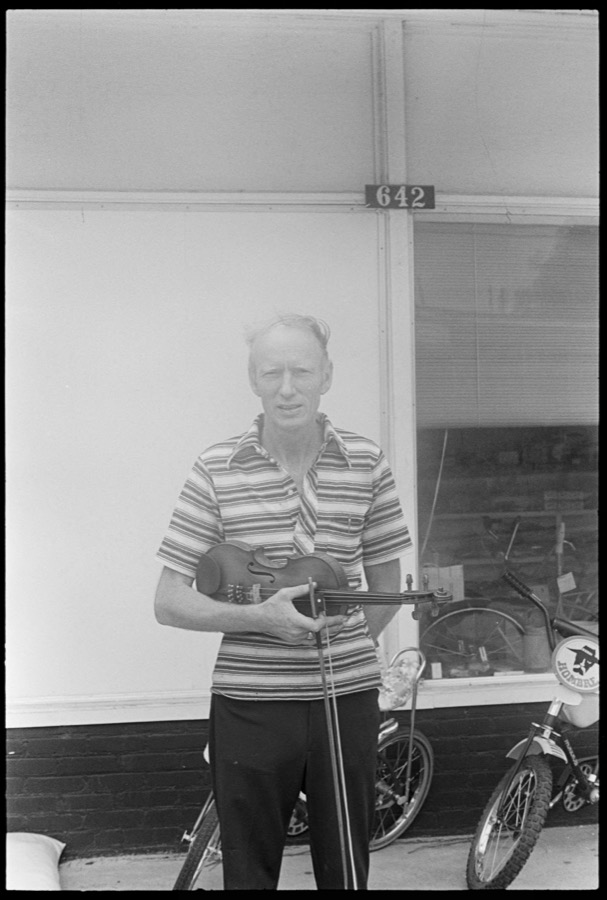 Fiddle-player Red Lindsey at Lindsey's Fix-It, Adel, Georgia; Musician John Guthrie, Ray City, Georgia