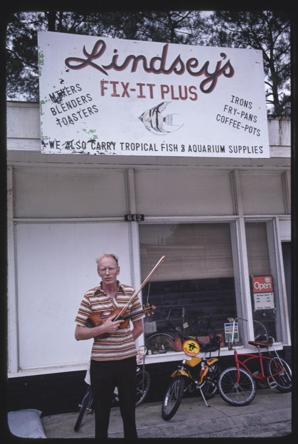 Fiddle-player Red Lindsey at Lindsey's Fix-It, Adel, Georgia; Musician John Guthrie, Ray City, Georgia